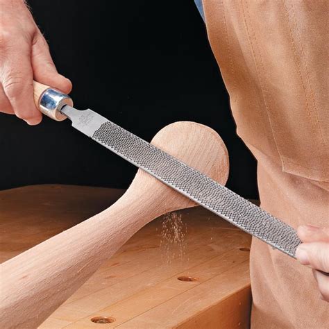 What is the tool used for smoothing curved edges of wooden furniture?