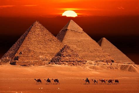 What is written on top of the pyramids?