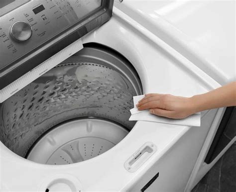 What natural ingredients can I use to clean my washing machine?