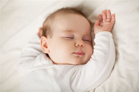 What position should a congested baby sleep in?