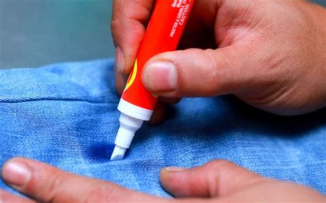 What removes permanent ink from fabric?