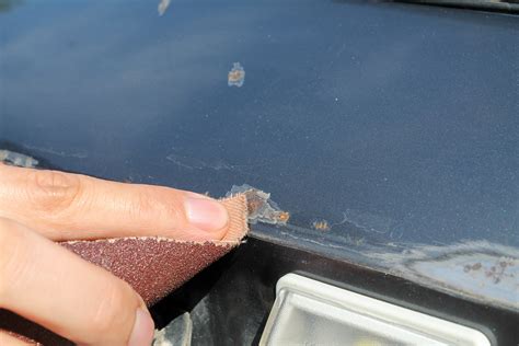 What sandpaper to use to remove paint from car?