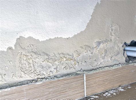 What stops damp on walls?