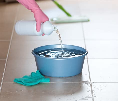 What surfaces should not be cleaned with bleach?