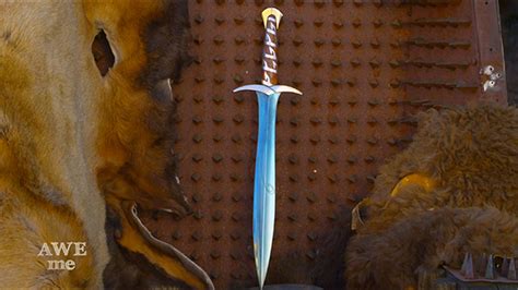 What sword glows blue?