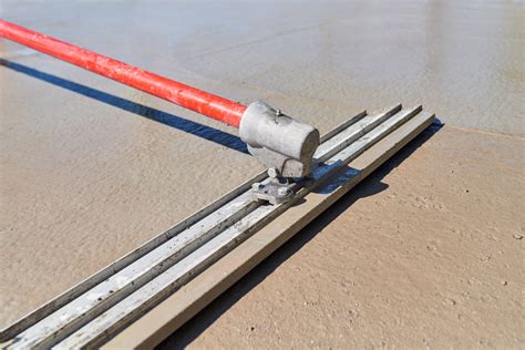 What tool is used to level concrete?