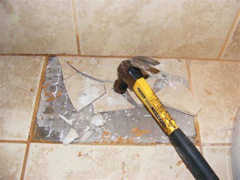 What tool to use to break ceramic tile?
