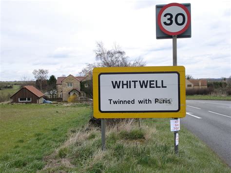 What town is Paris twinned with?