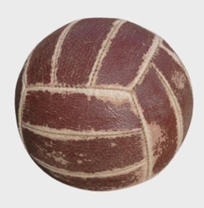 What was used as the first volleyball?