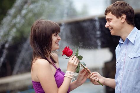 When a girl gives a guy a rose?