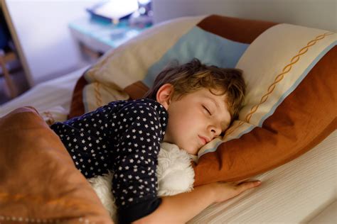 When can children sleep on regular mattress?