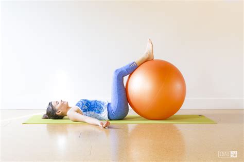 When should I start sitting on a yoga ball?