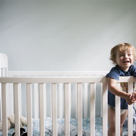 When should I switch my baby to a toddler bed?