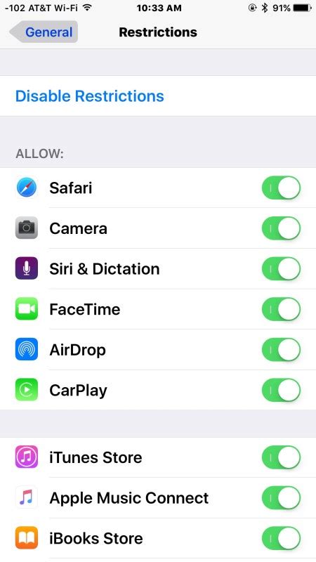 Where is camera restrictions on iPhone?
