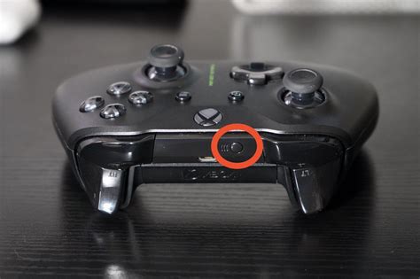 Where is the controller pair button on Xbox One?