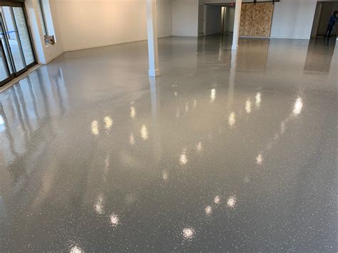 Which is cheaper epoxy or polished concrete?