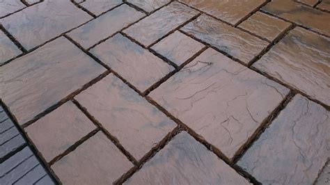 Which is cheaper slabs or block paving?