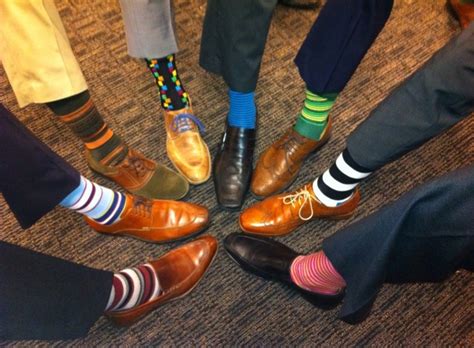 Which people wear colorful socks?
