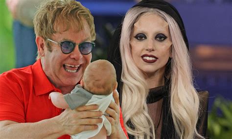 Which singer is a godmother to Elton John?