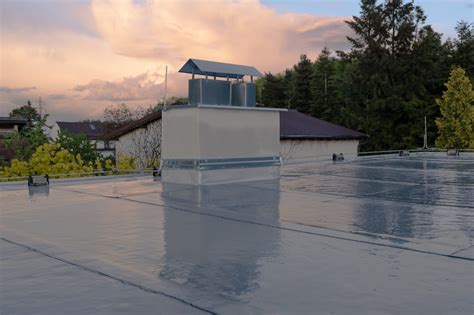 Which type of flat roof covering has the longest lifespan?