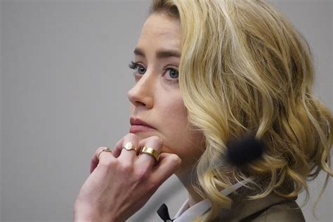 Who are the men who support Amber Heard?