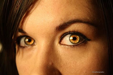 Who has natural yellow eyes?