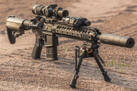 Who makes AR-15 for U.S. military?