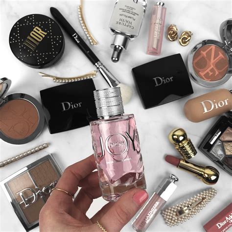 Who manufactures Dior cosmetics?