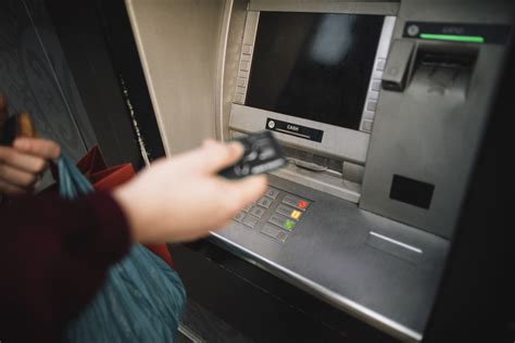 Who pays an ATM owner?