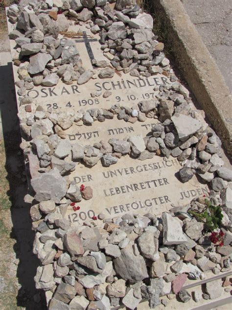 Who put the rose on Schindler's grave?