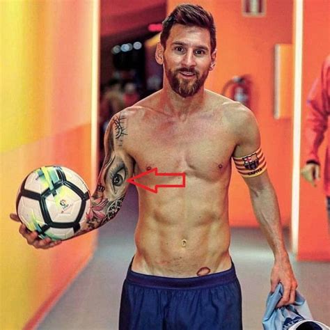 Whose eye is tattooed on Messi?