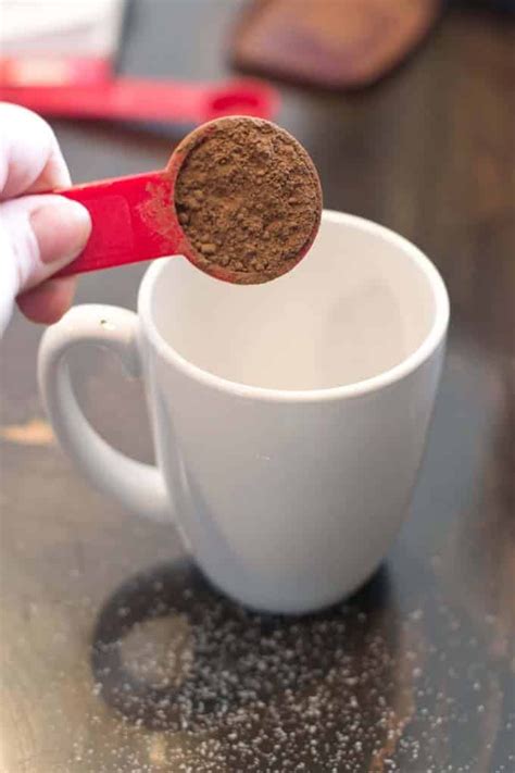 Why add hot water to cocoa powder?