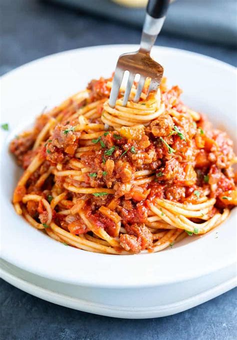 Why add vinegar to bolognese?