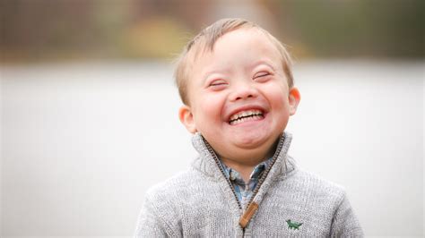 Why are Down's syndrome so happy?