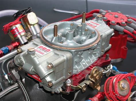 Why are carbureted engines hard to start in the cold?