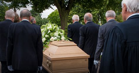 Why are coffins carried head first?