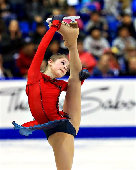 Why are female figure skaters flat chested?