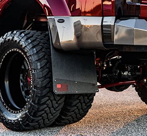 Why are mud flaps in front of rear wheels?