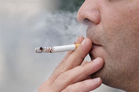 Why can I taste and smell cigarette smoke?