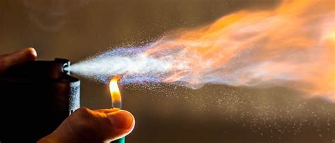 Why can aerosol explode when exposed to an open flame?
