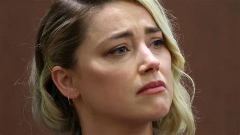 Why did Amber Heard move to Spain?