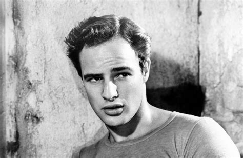 Why did Marlon Brando use an earpiece?