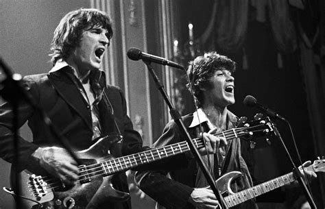 Why didn t Robbie Robertson sing in the Band?