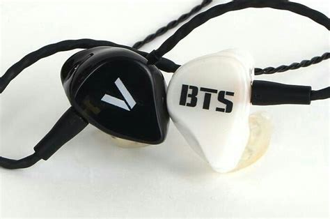 Why do BTS wear earpieces?