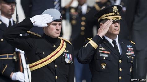Why do British Army and Navy salute differently?