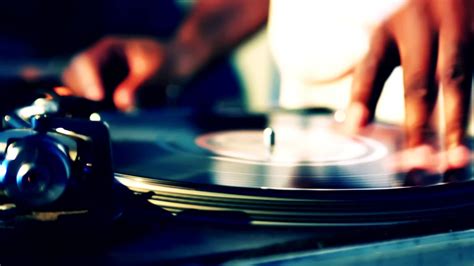 Why do DJs touch vinyl records?