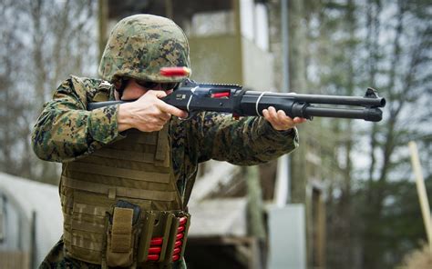 Why do Marines carry shotguns?