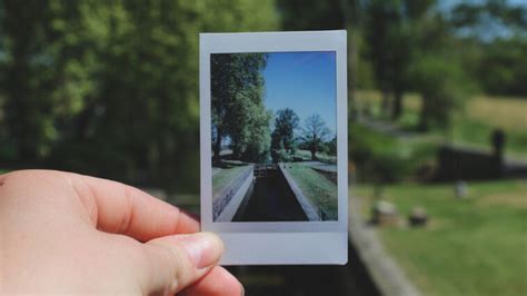 Why do Polaroids look so dark?