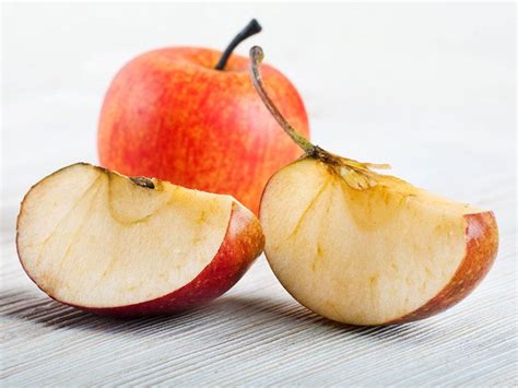 Why do apple slices turn brown so fast?