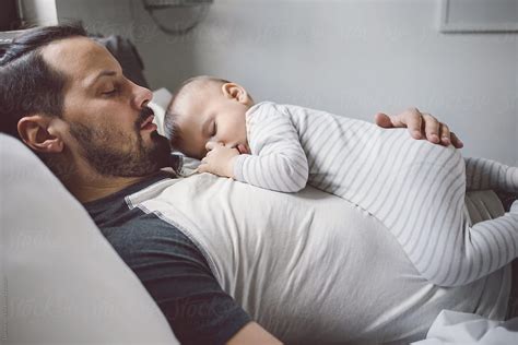 Why do babies sleep better for dad at night?